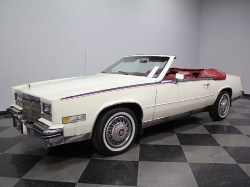 Classy white, 76k original miles, 4.1 liter, fully loaded, power top, luxurious