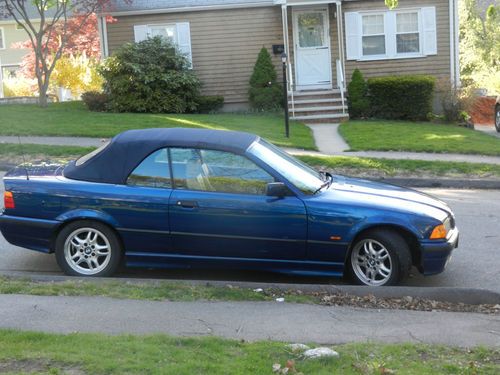 1998 328ic convertible, 5 speed manual, leather heated seats,