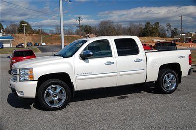 Save $8741 at empire chevy on this new fully loaded white diamond ltz plus 4x4