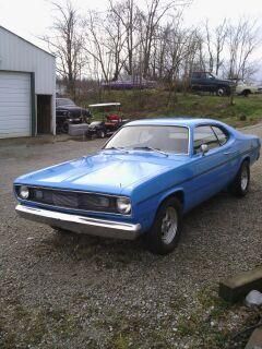 71 duster from kentucky real nice driver new paint auto was 4 speed still has