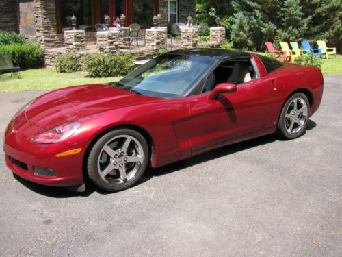 2006 corvette coupe 6 speed, monterey red  transparent  top  z51 and lt2 options