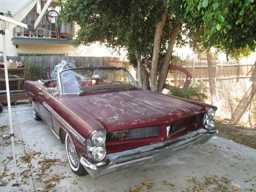 1963 pontiac bonniville convertible stored for the last 10 years runs good.