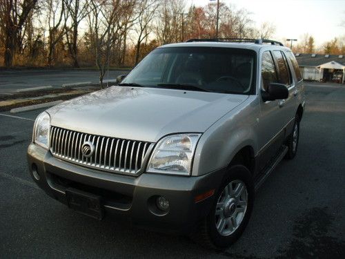 2004 mercury mountaineer,awd,third row seats,leather,roof,cd,loaded,no reserve!!