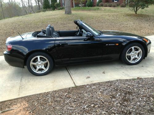 Collector quality 2003 honda s2000, 7562 miles, garage kept, one owner.
