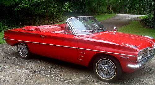 1962 lemans convertible,red/red/blk,67k miles,4v,auto,california car,restoredexc