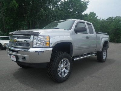 Lifted lt1 silver black interior vortec 5.3l v8  7 1/2" rough country lift nitto