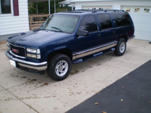 Gmc suburban, blue, 4wd, 1500, tinted windows, 3rd seat, tow package.