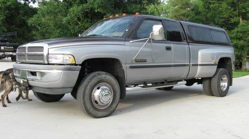 1998 dodge 3500 dolley 4x4 cummings diesel ext cab, runs great ,ice cold air,