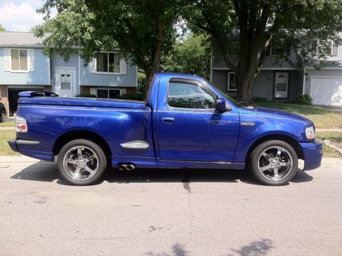 2004 ford f150 svt lightning - sonic blue - low miles - super charged (rare)
